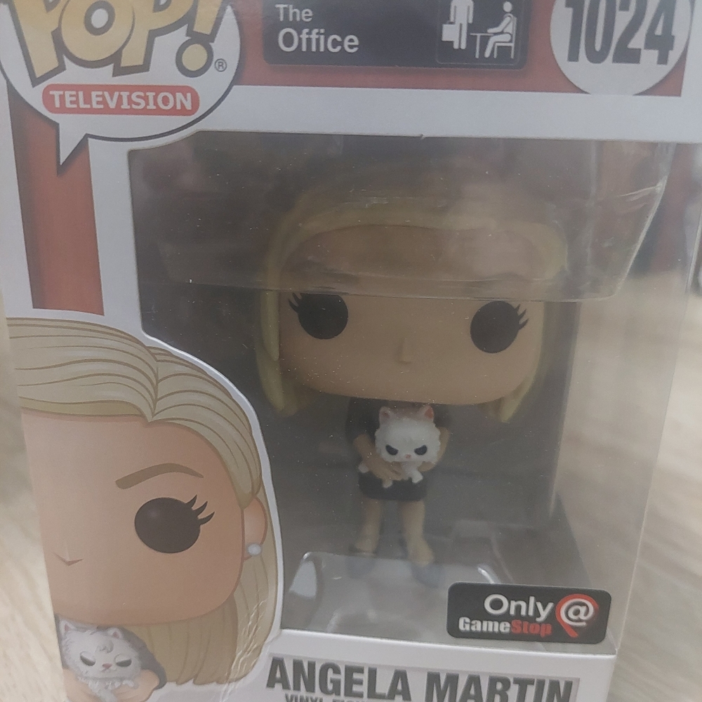 The Office Angela with her cat funk pop brand new in box mint cond.